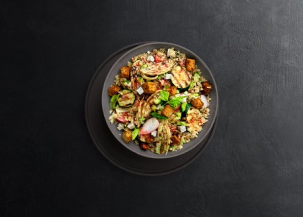 Plated bowl of steamed quinoa and vegetables
